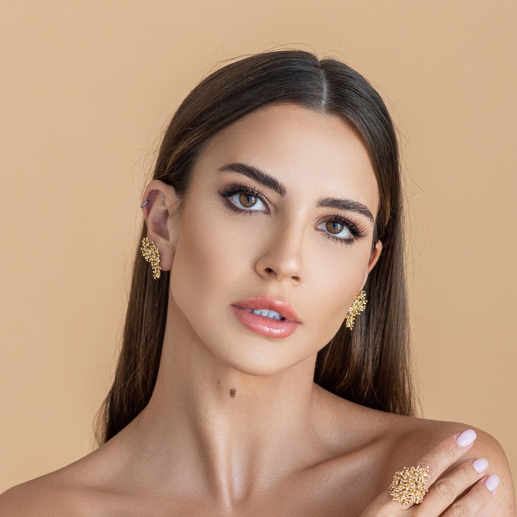 Coral Earrings by Tariq Riaz in 18k Gold Beautifully inspired by coral reefs featuring VVS-1 Diamonds.